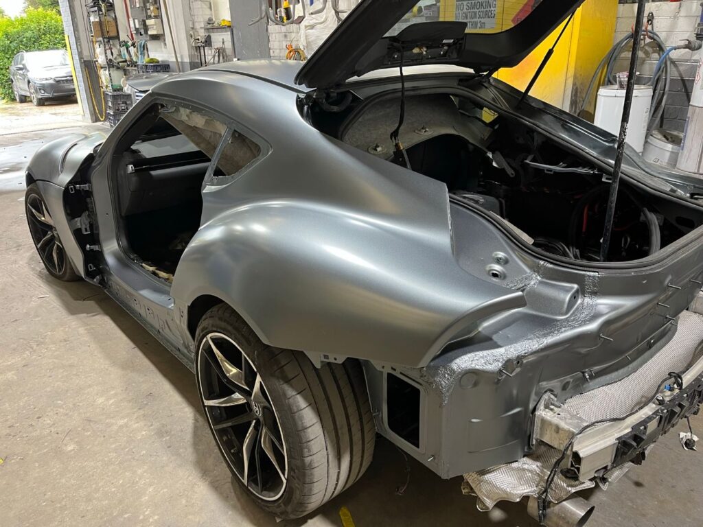 Toyota GR Supra with new rear quarter panel fitted and primed